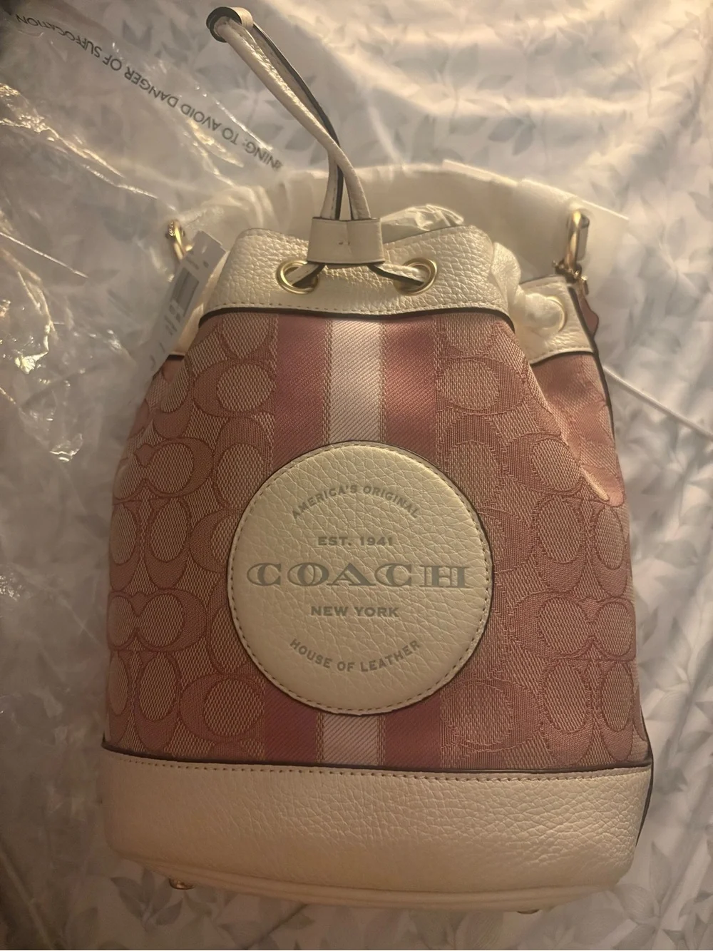 COACH Pink and Cream Signature Stripe Drawstring Bucket Shoulder Bag
